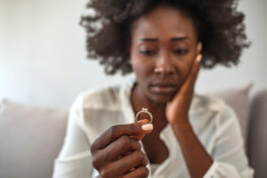 woman holding her ring