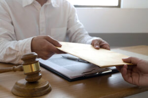 lawyer send a contract documents to client in office
