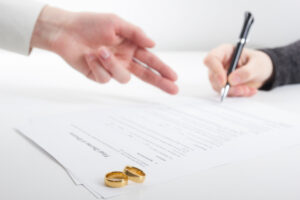 filing divorce papers or premarital agreement prepared by lawyer